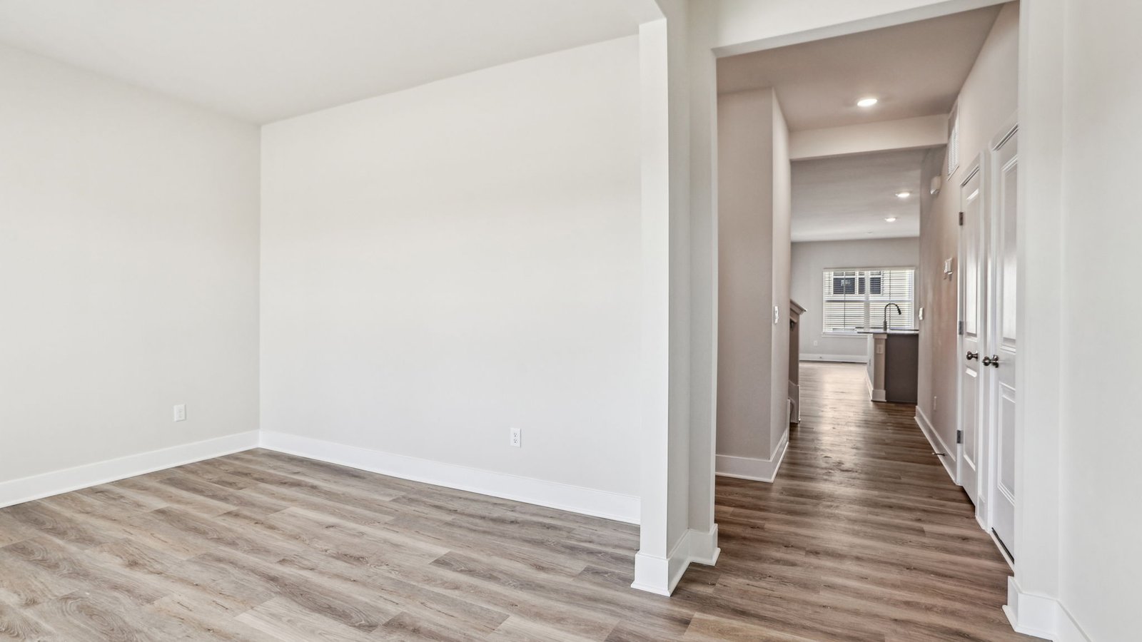 The foyer immediately opens up into a spacious dining room