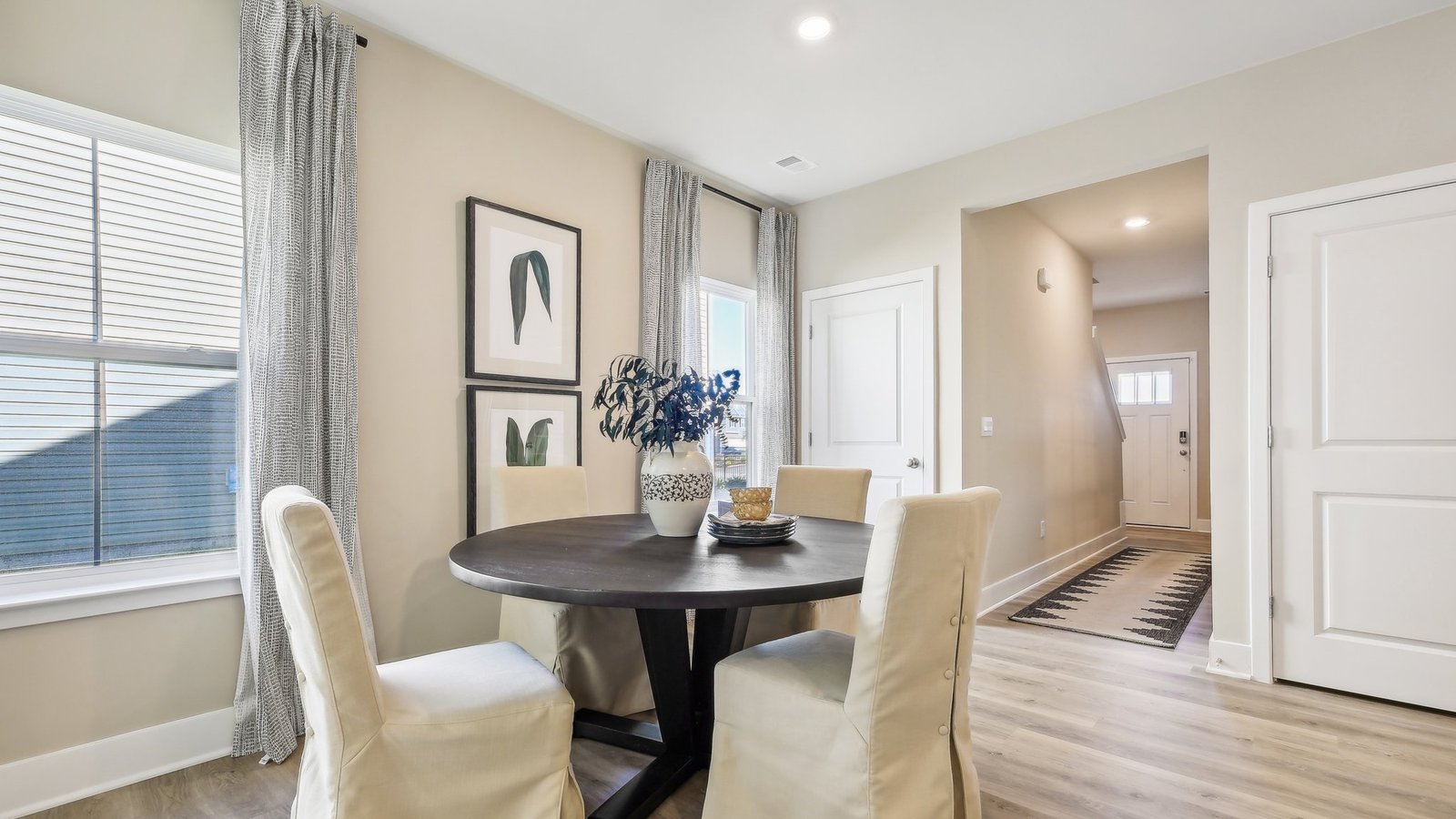 Dining table situated across from the front door