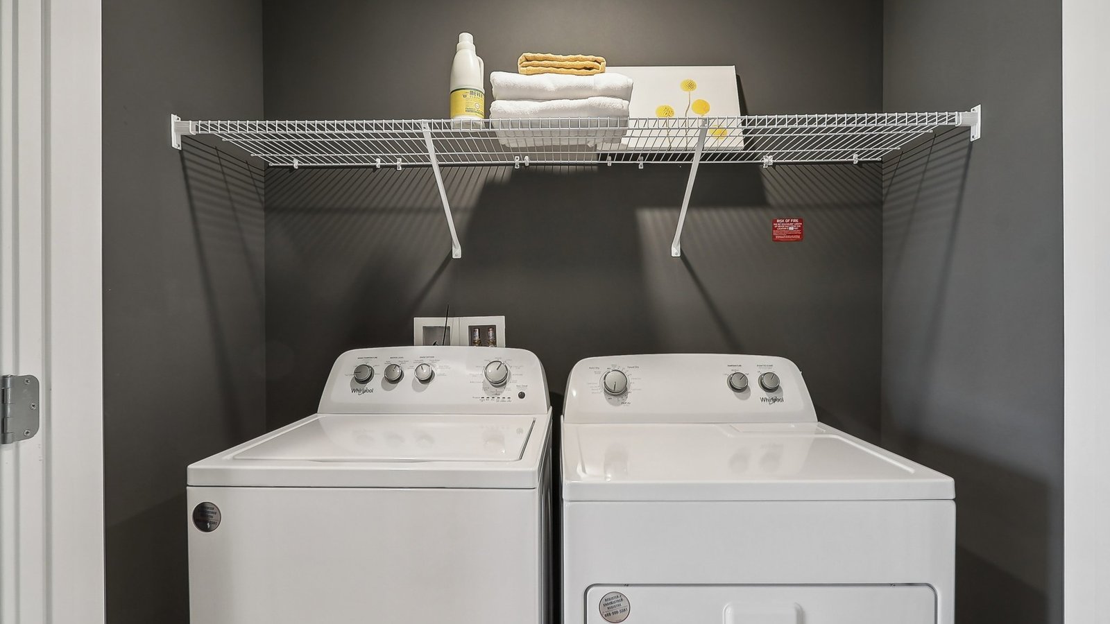 laundry upstairs with storage