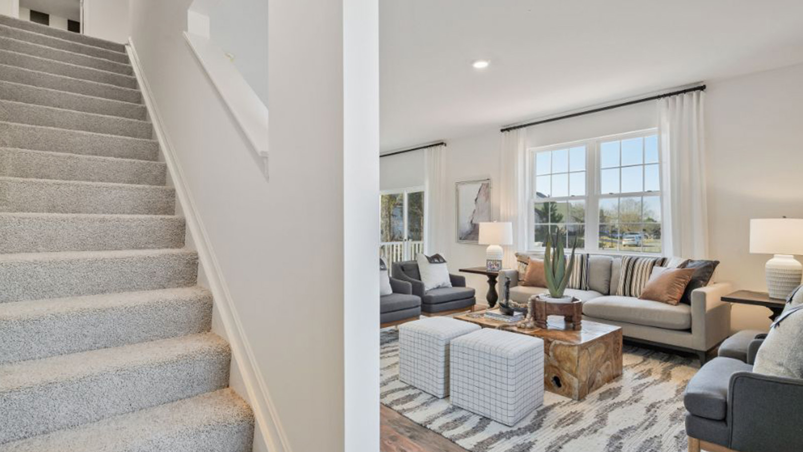 Carpeted stairs from main floor to upstairs