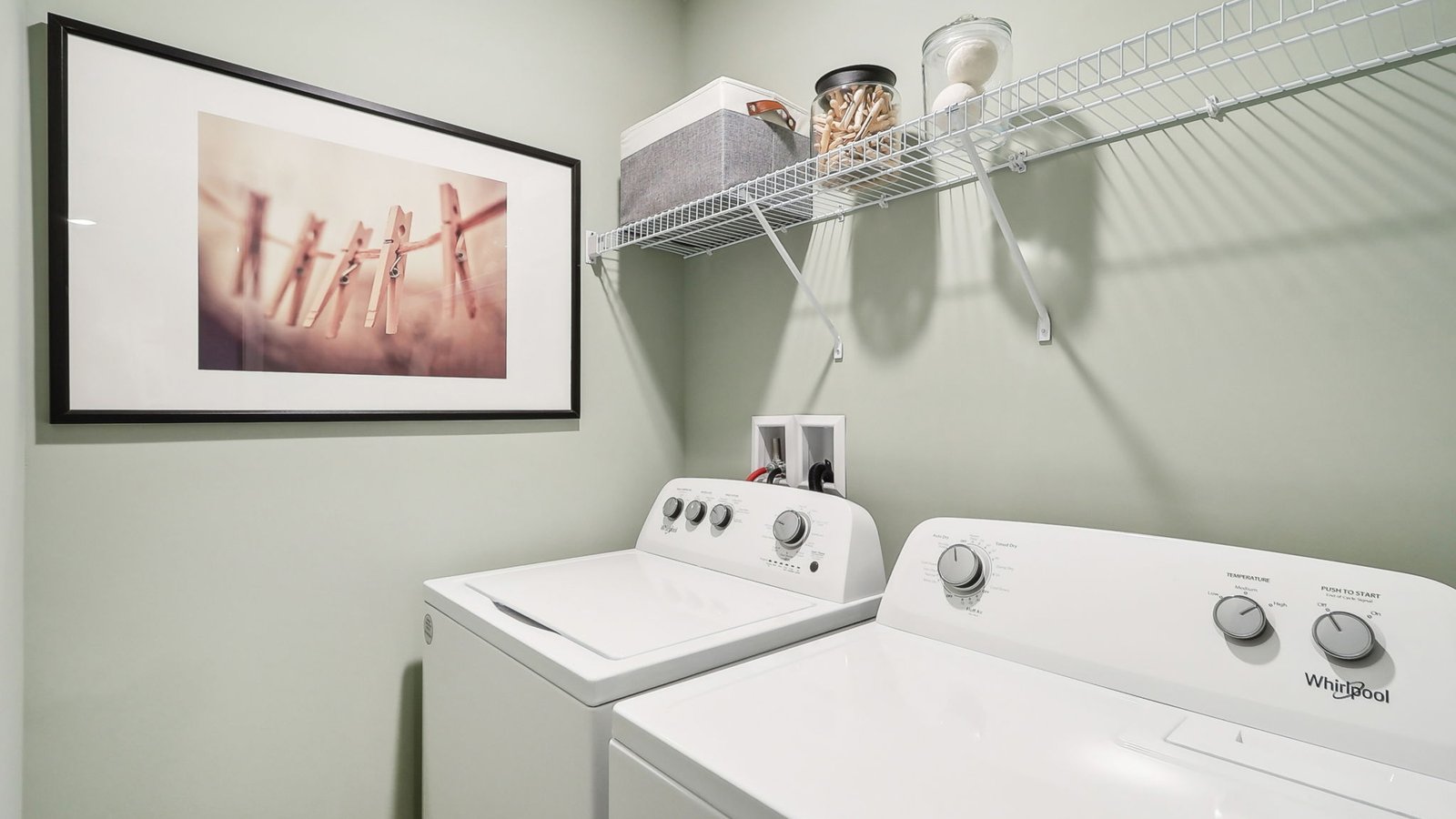 laundry room with storage