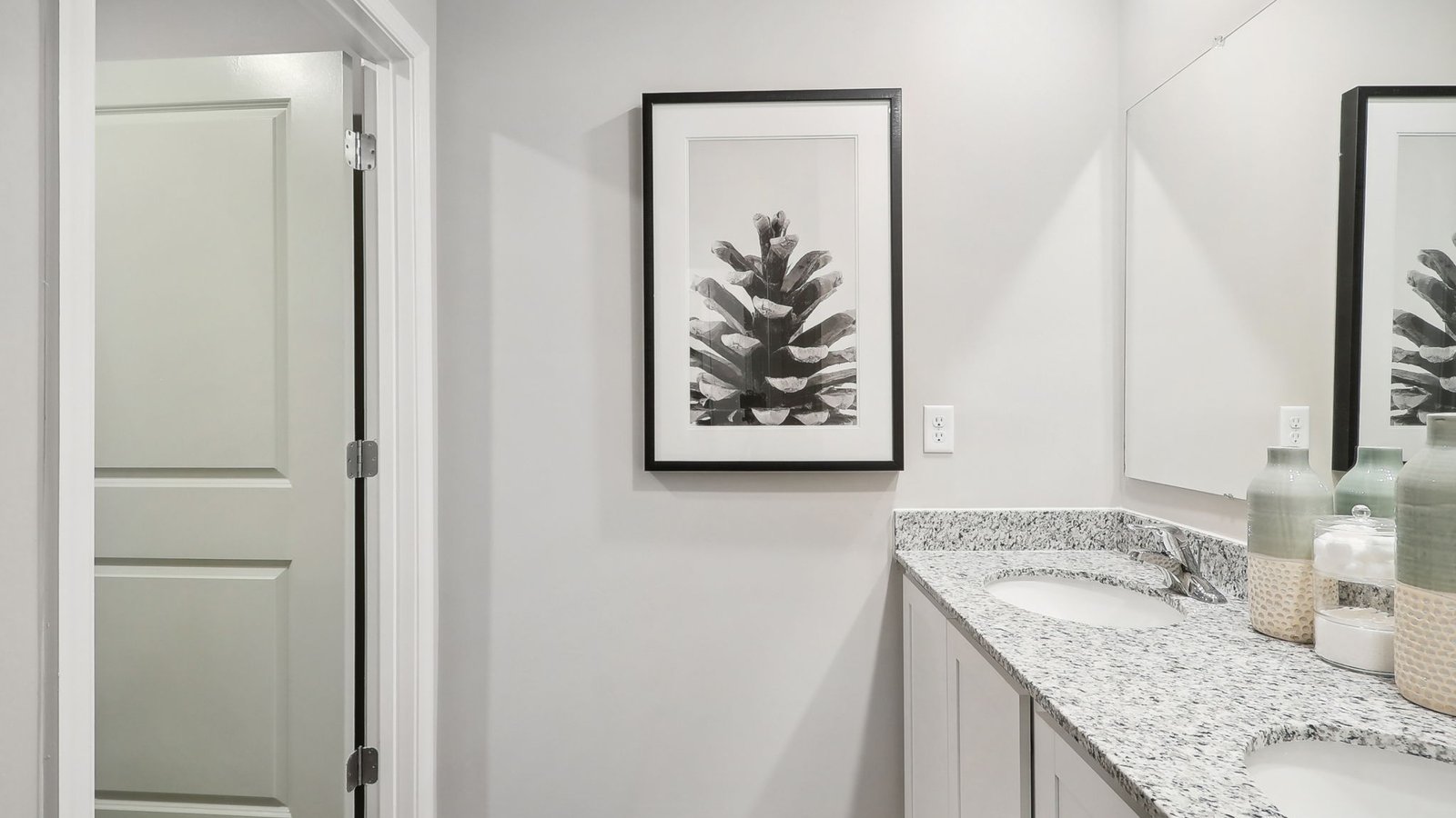 secondary full bath with double sink vanity