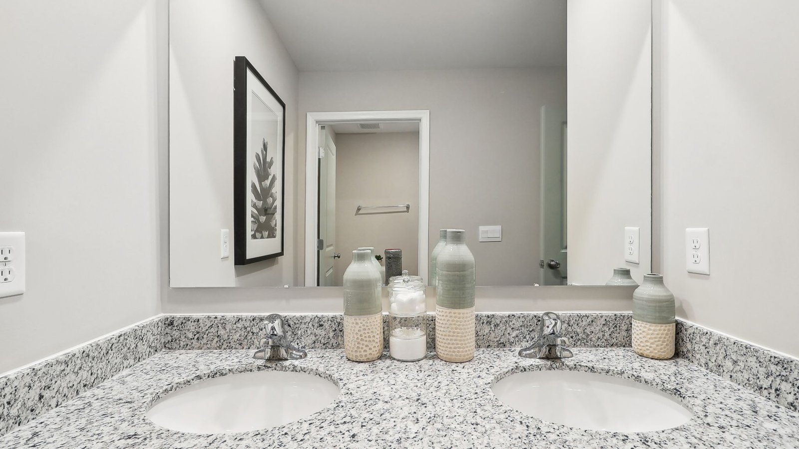 secondary full bath with double sink vanity