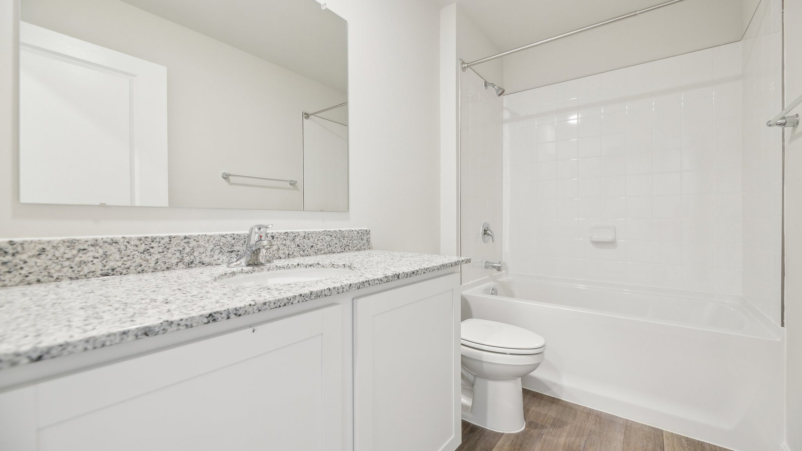 secondary full bathroom with extra countertop space