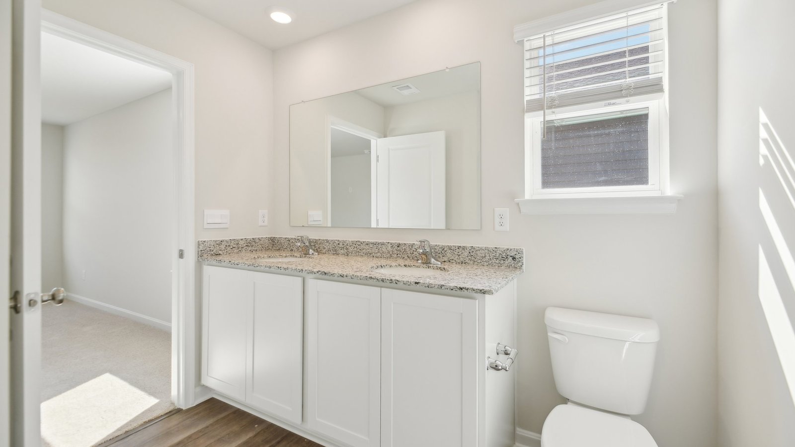 primary en suite bathroom with double sink vanity