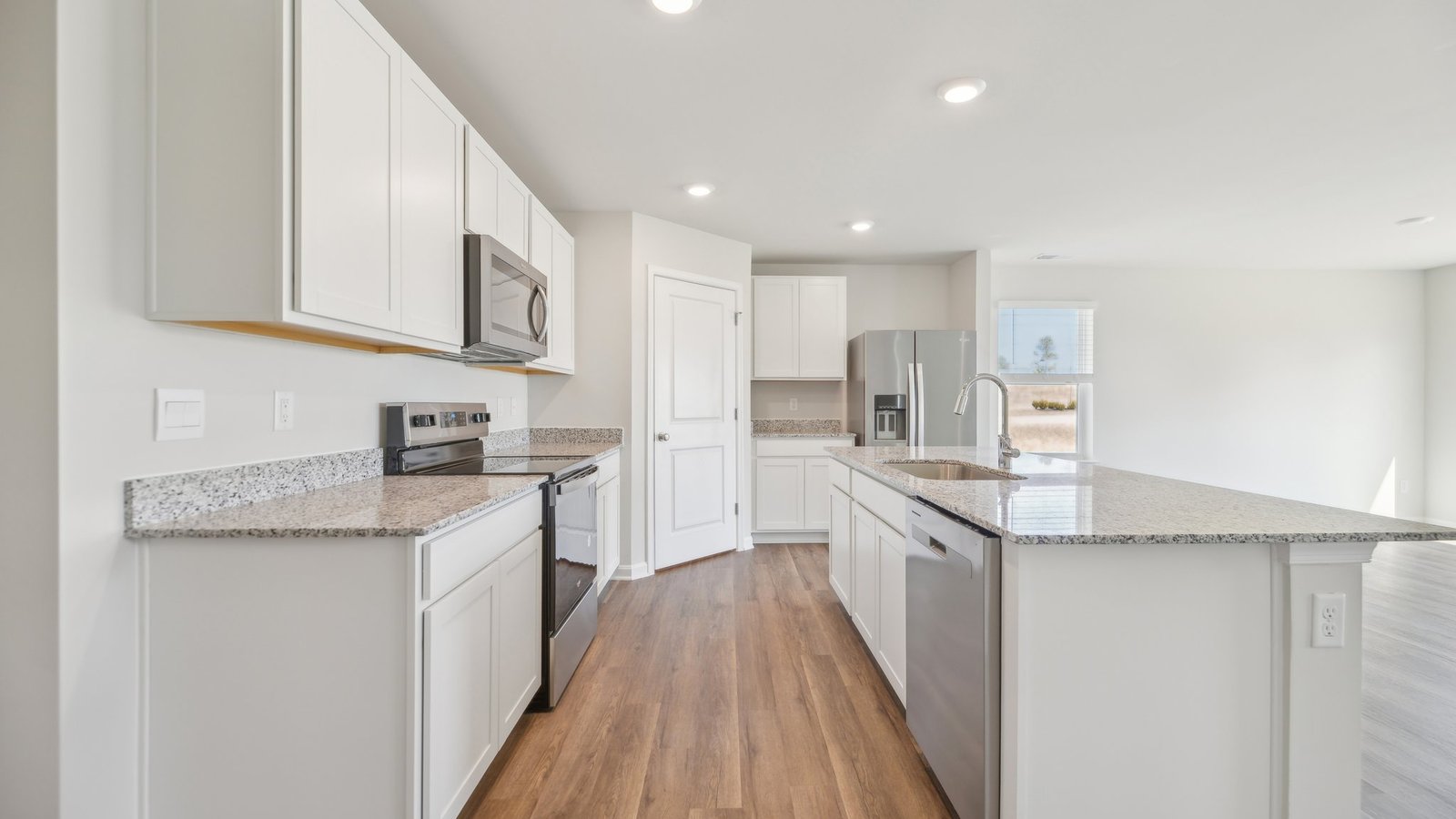 Kitchen sink and dishwasher come installed into the kitchen island