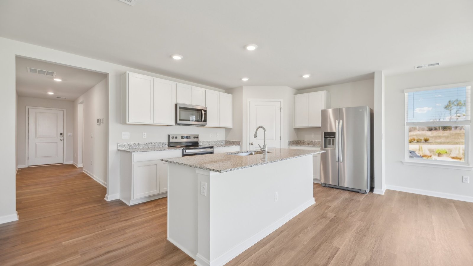 Oversized breakfast island is perfect for casual dining