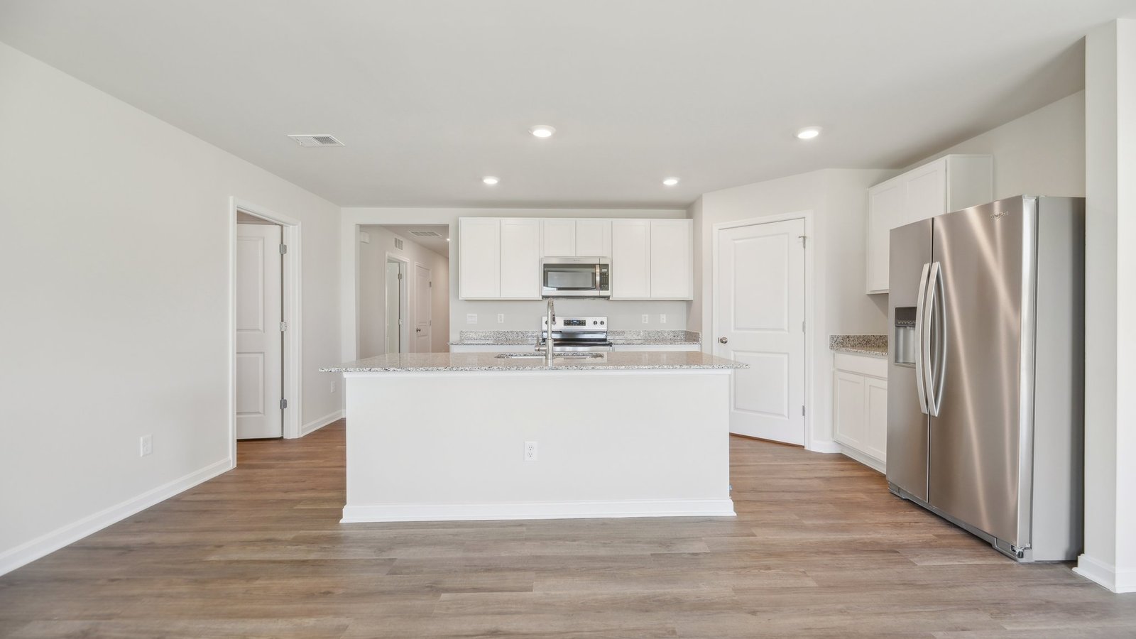 Large pantry is located in the corner of the kitchen