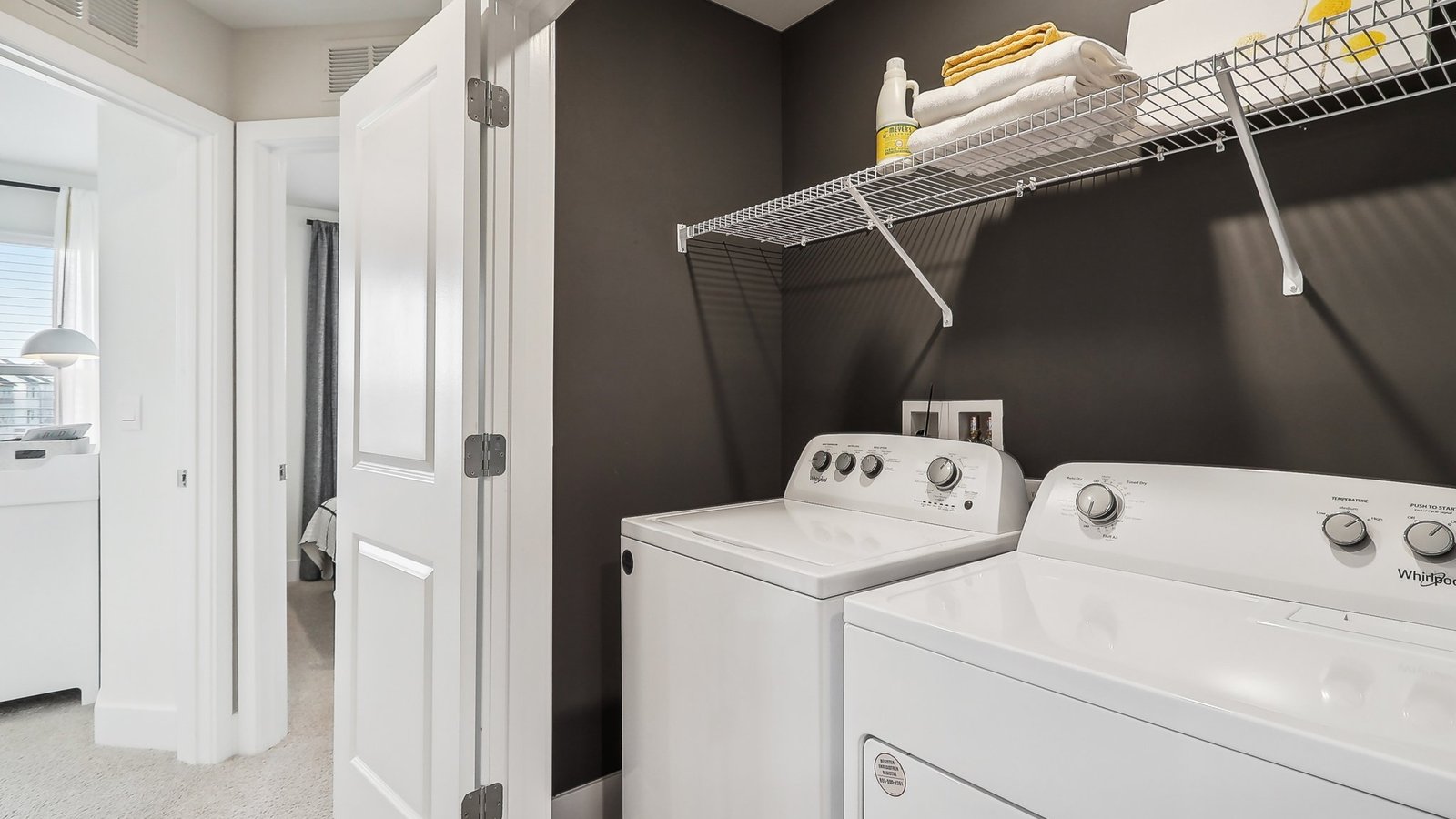 laundry room with storage