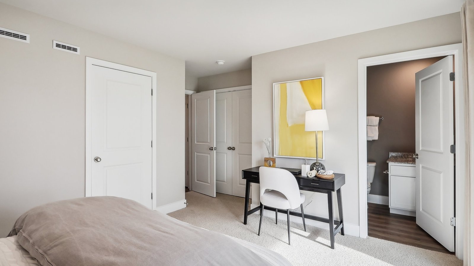 secondary bedroom with full bath