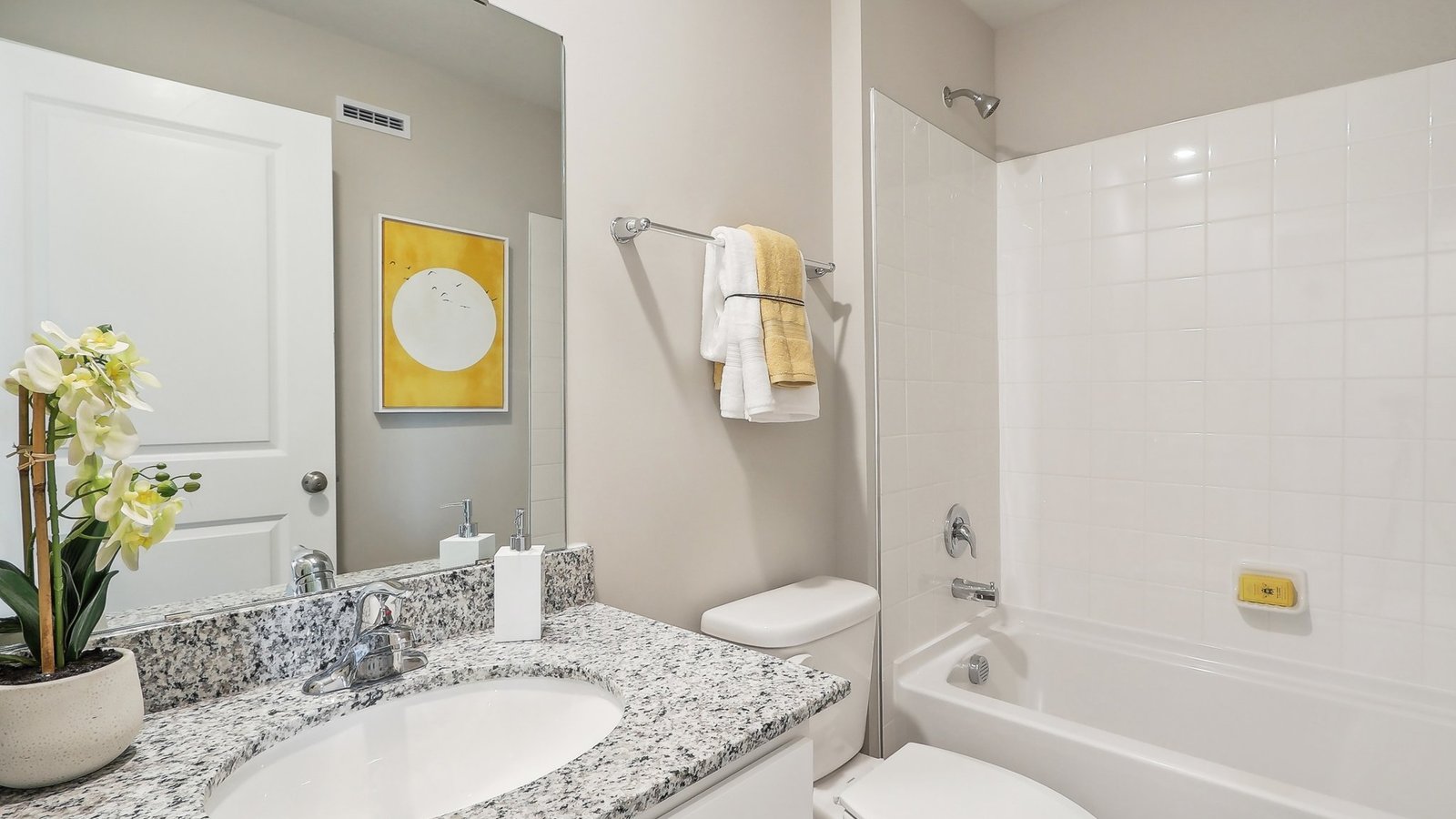 primary bathroom with double sink vanity
