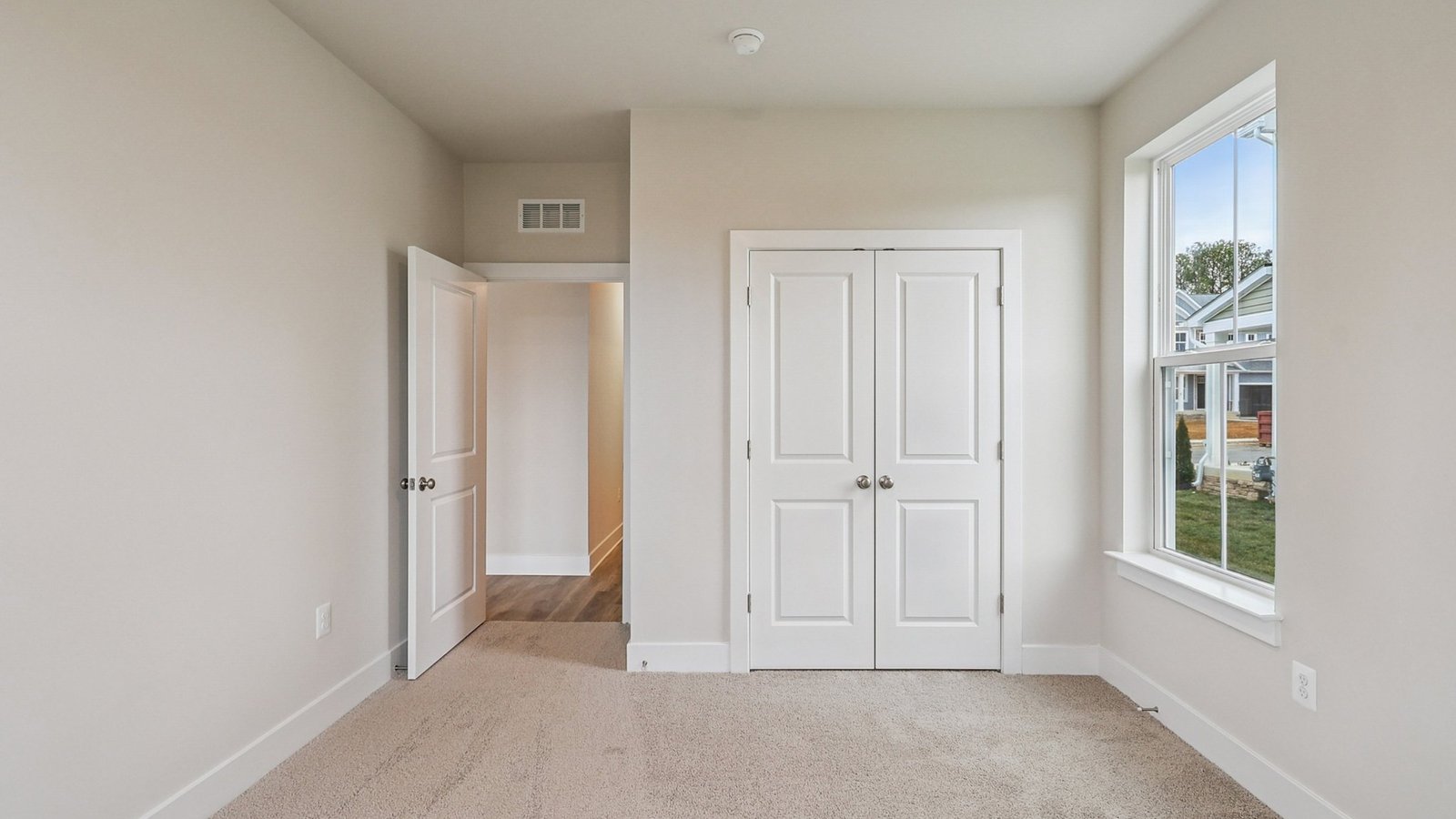 First floor guest bedroom closet closed doors