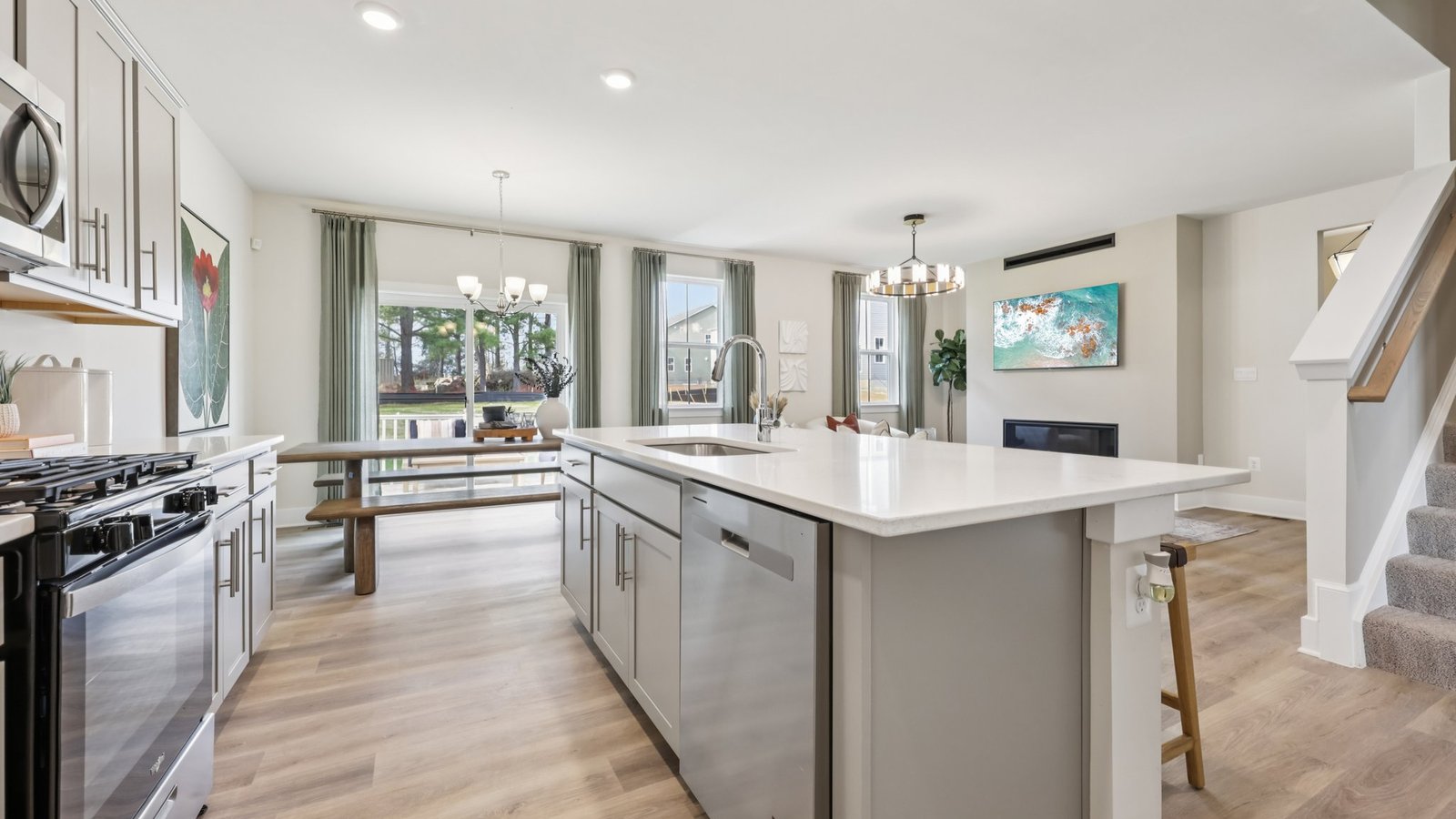 Modern and spacious kitchen with large island and casual dining and great room