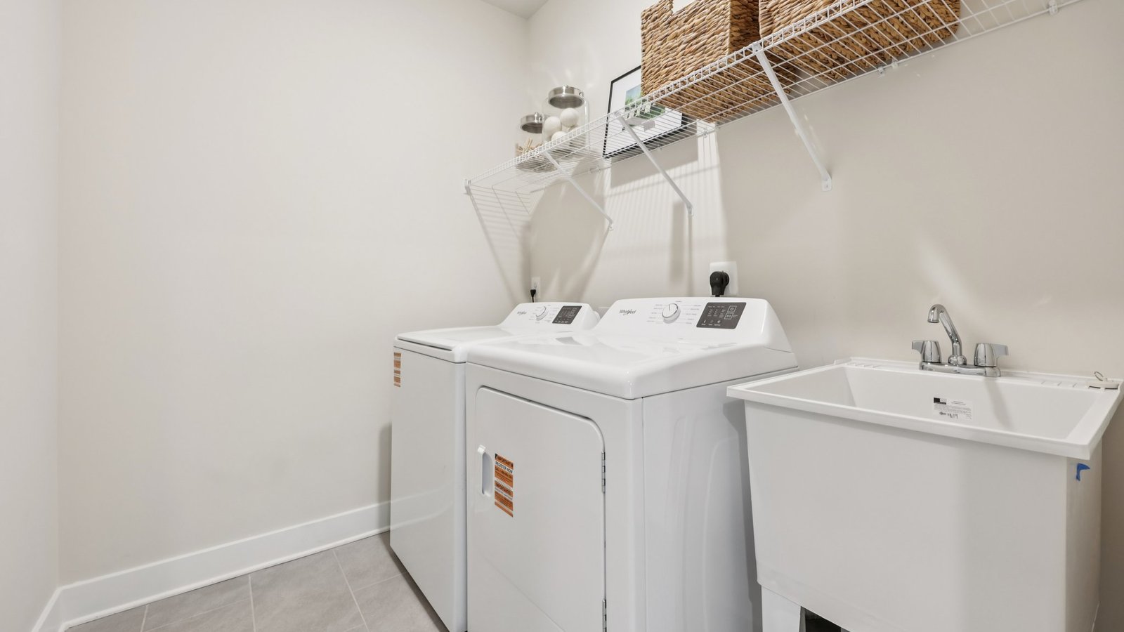 laundry room with storage