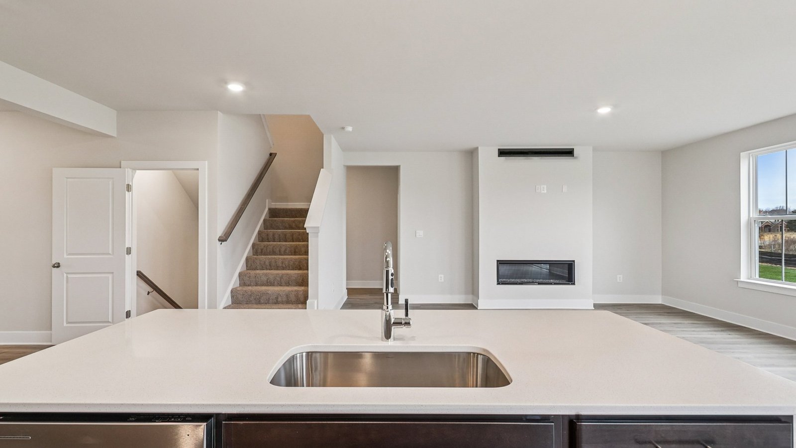 Kitchen island is facing living area
