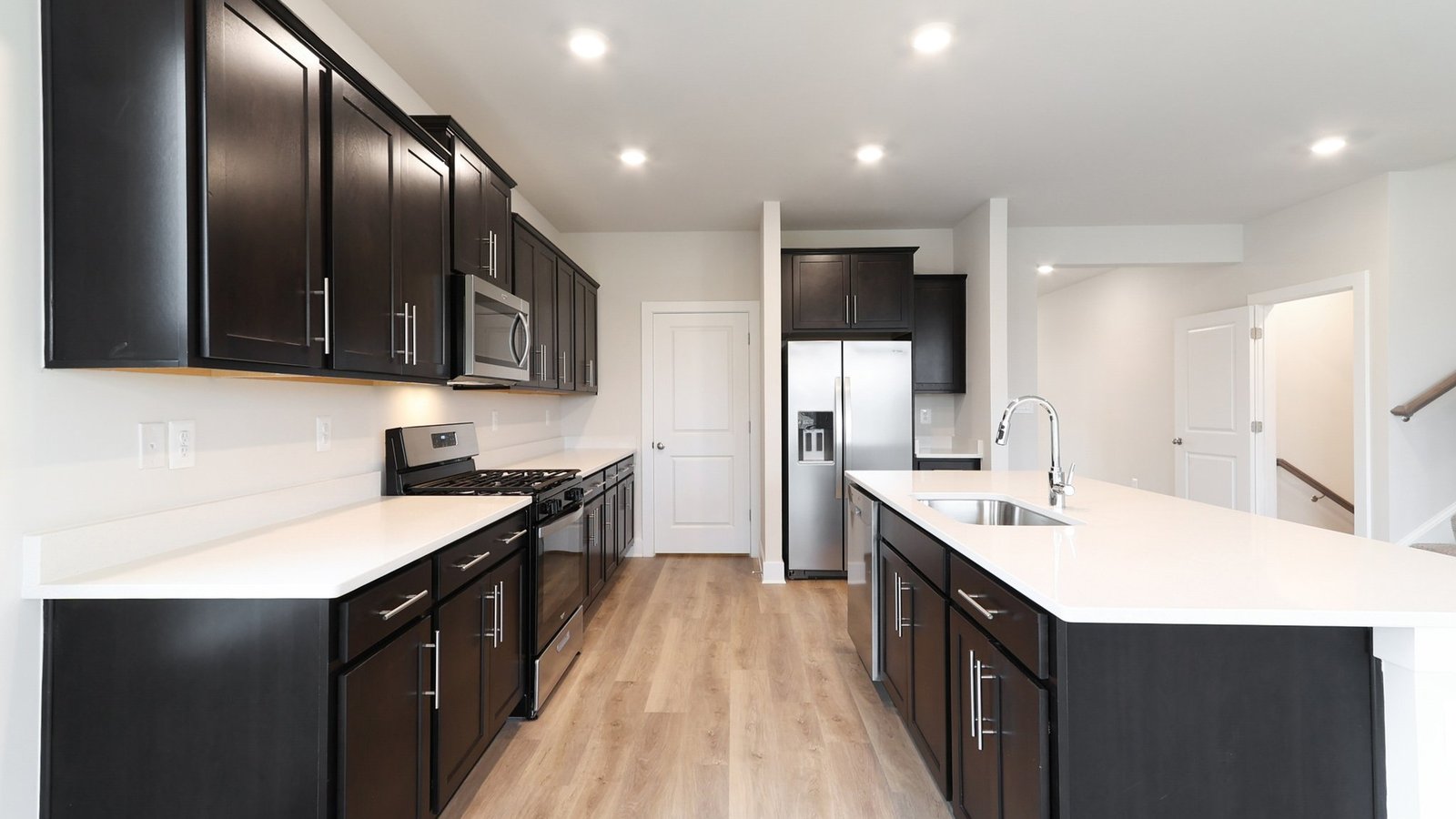 Kitchen with brown cabinets