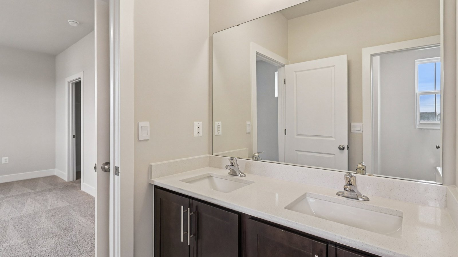 Jack and Jill bathroom on a second floor with double sink