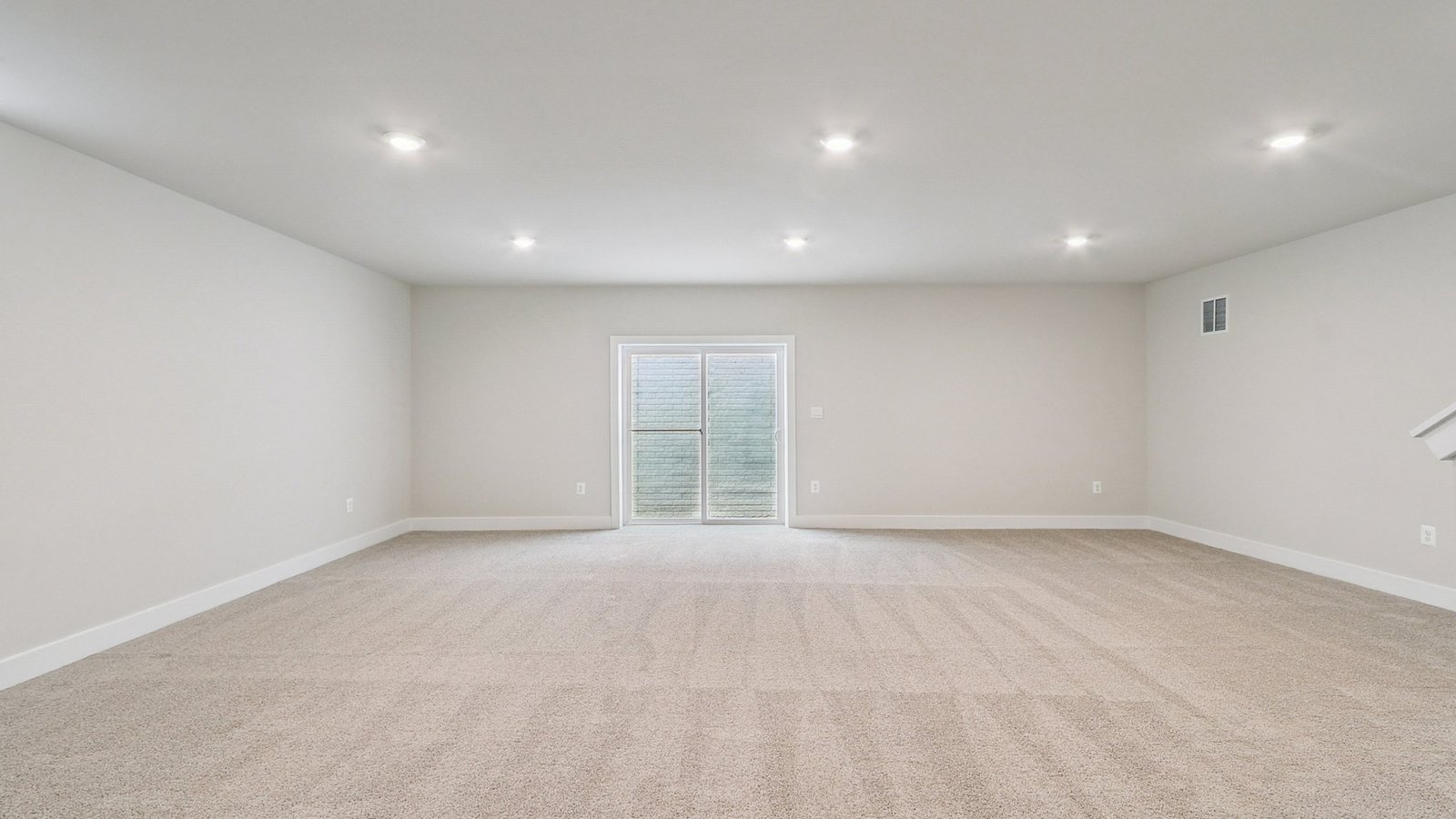 Rec room in a basement with access to the outside