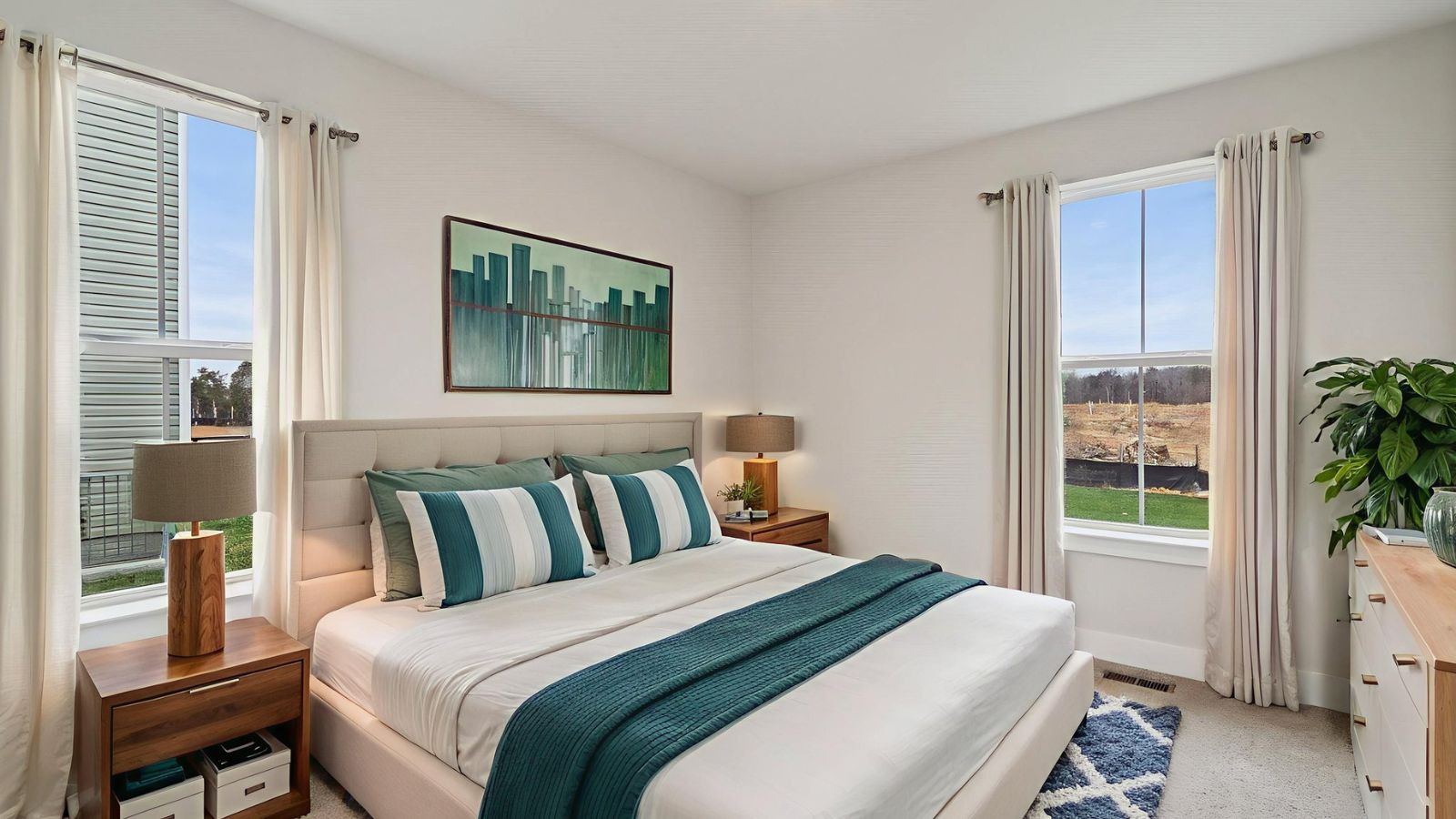 Comfortable secondary bedroom in a new construction home in Fredericksburg, VA with bright natural light and versatile living space.