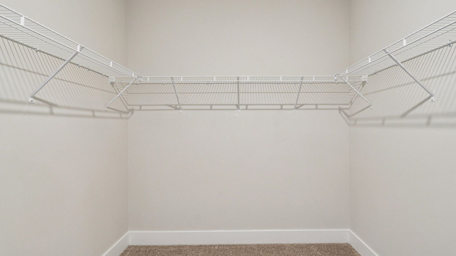 Large walk-in closet in primary suite