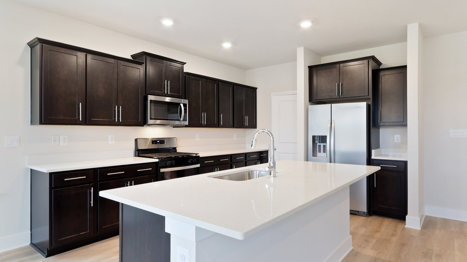 Kitchen with brown cabinets