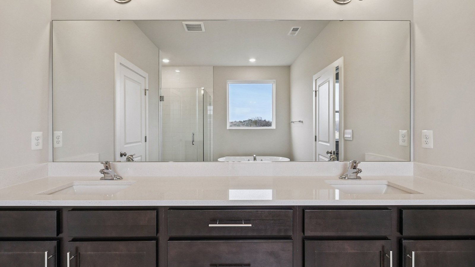 Owners bathroom with a double sinks