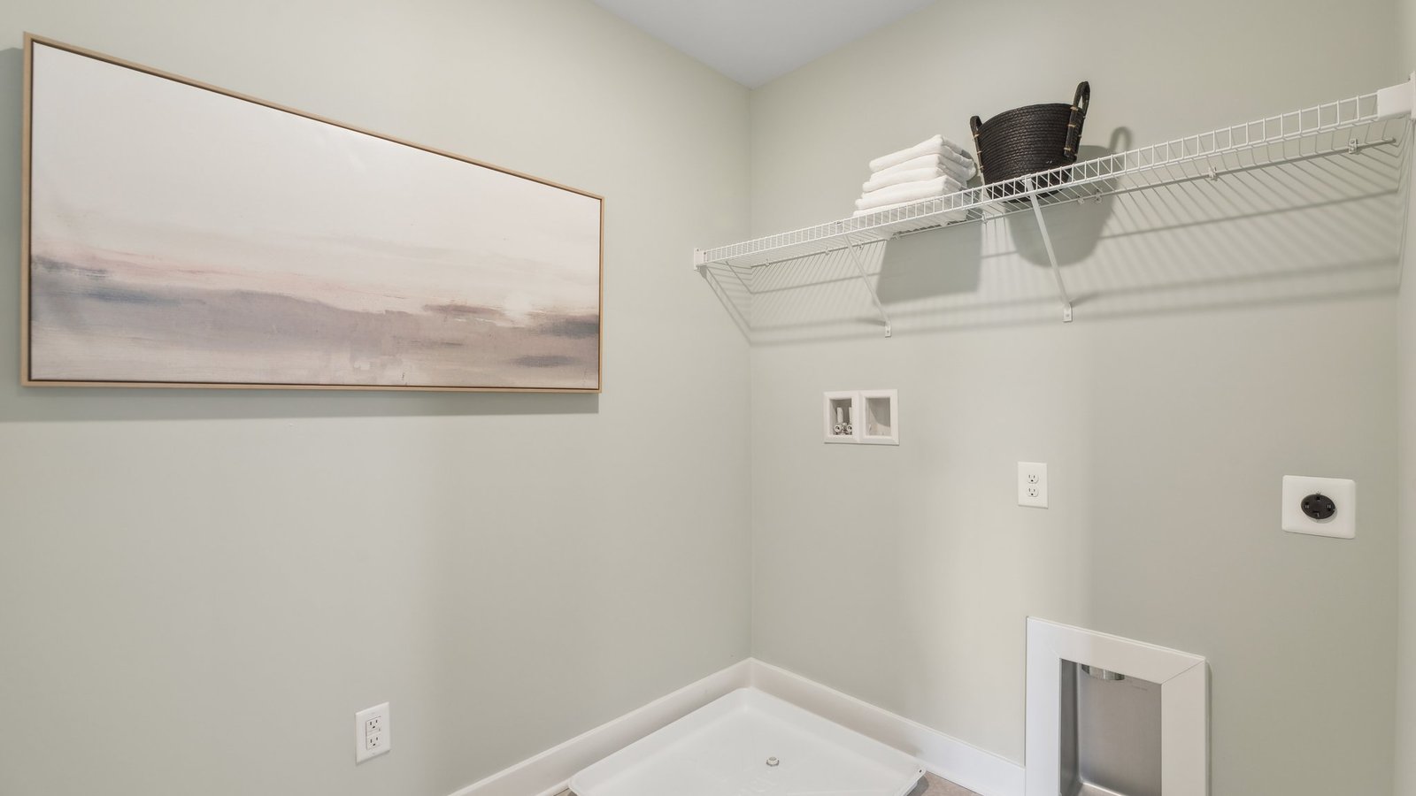 laundry room with storage