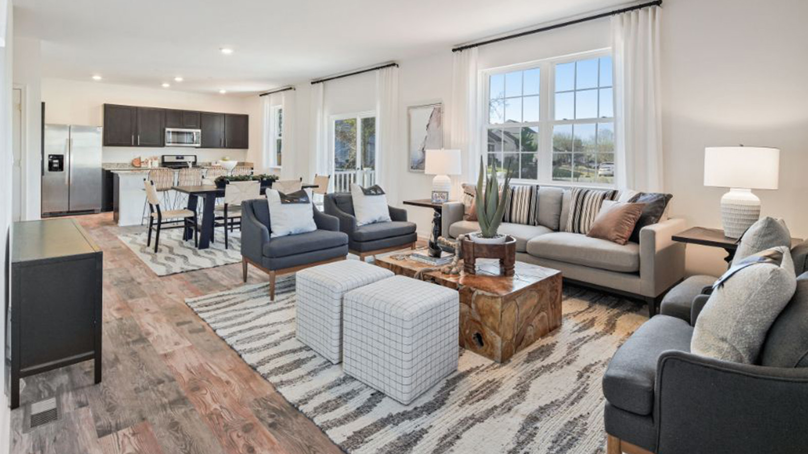 open concept living room, dining room, and kitchen