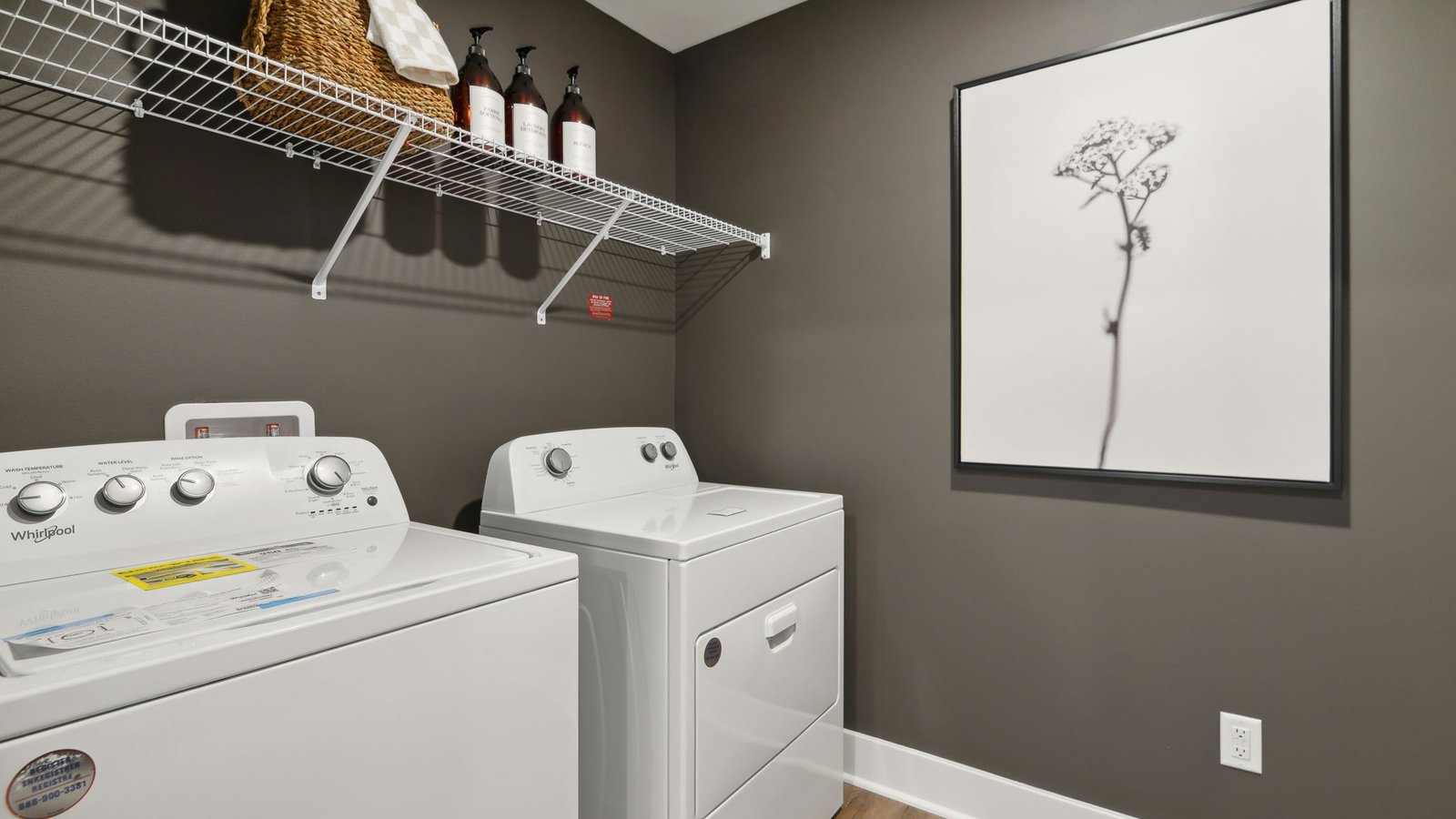 laundry room with storage shelves