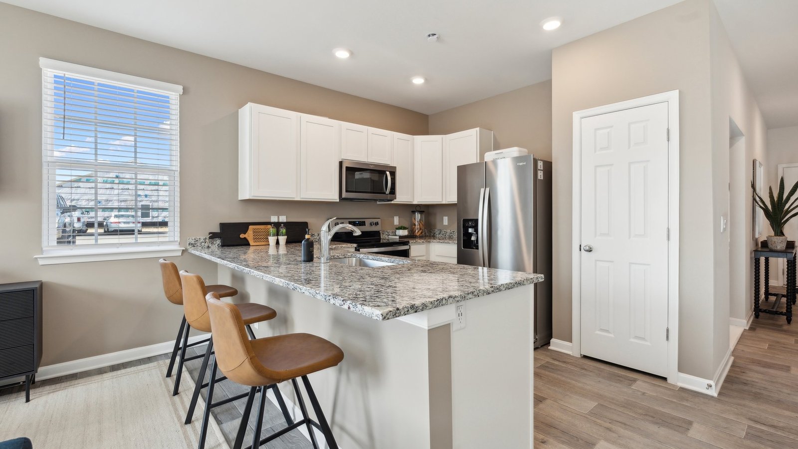 Your open concept living is just straight through the foyer when you come in