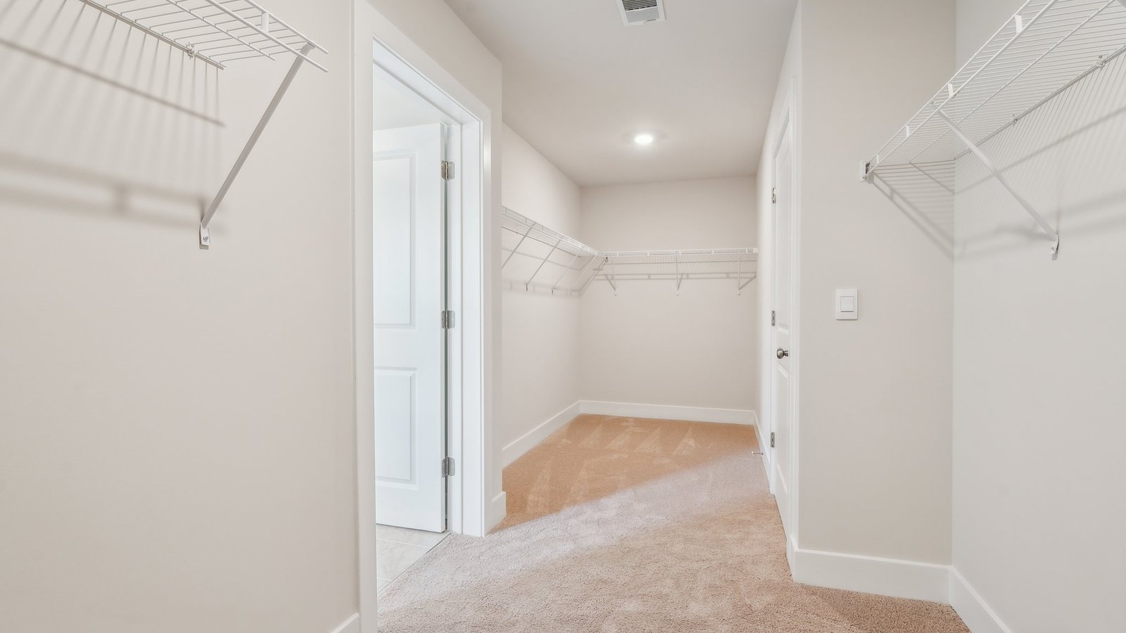 extremely spacious walk-in primary closet