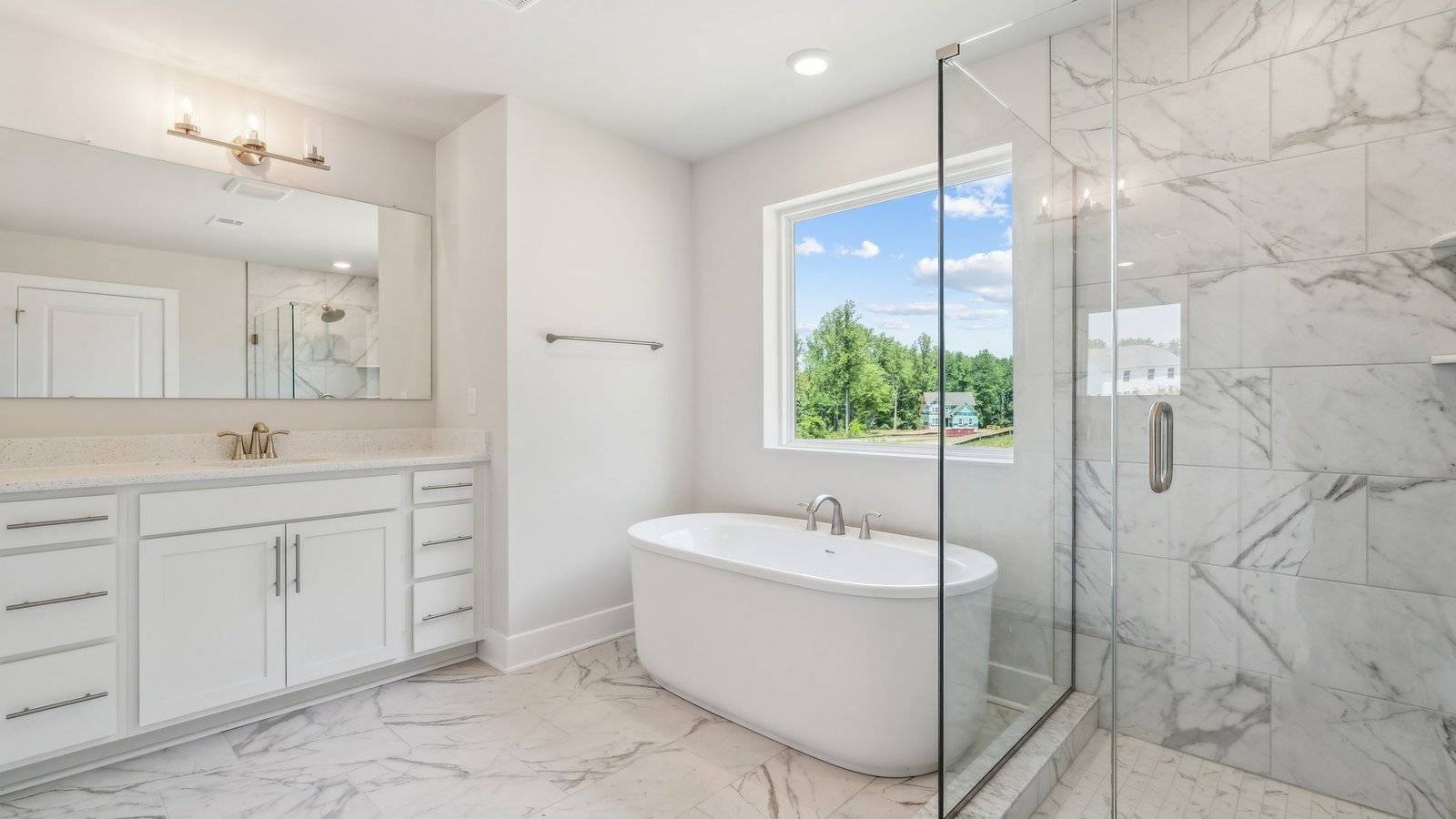 primary bathroom complete with shower and adjacent bathtub