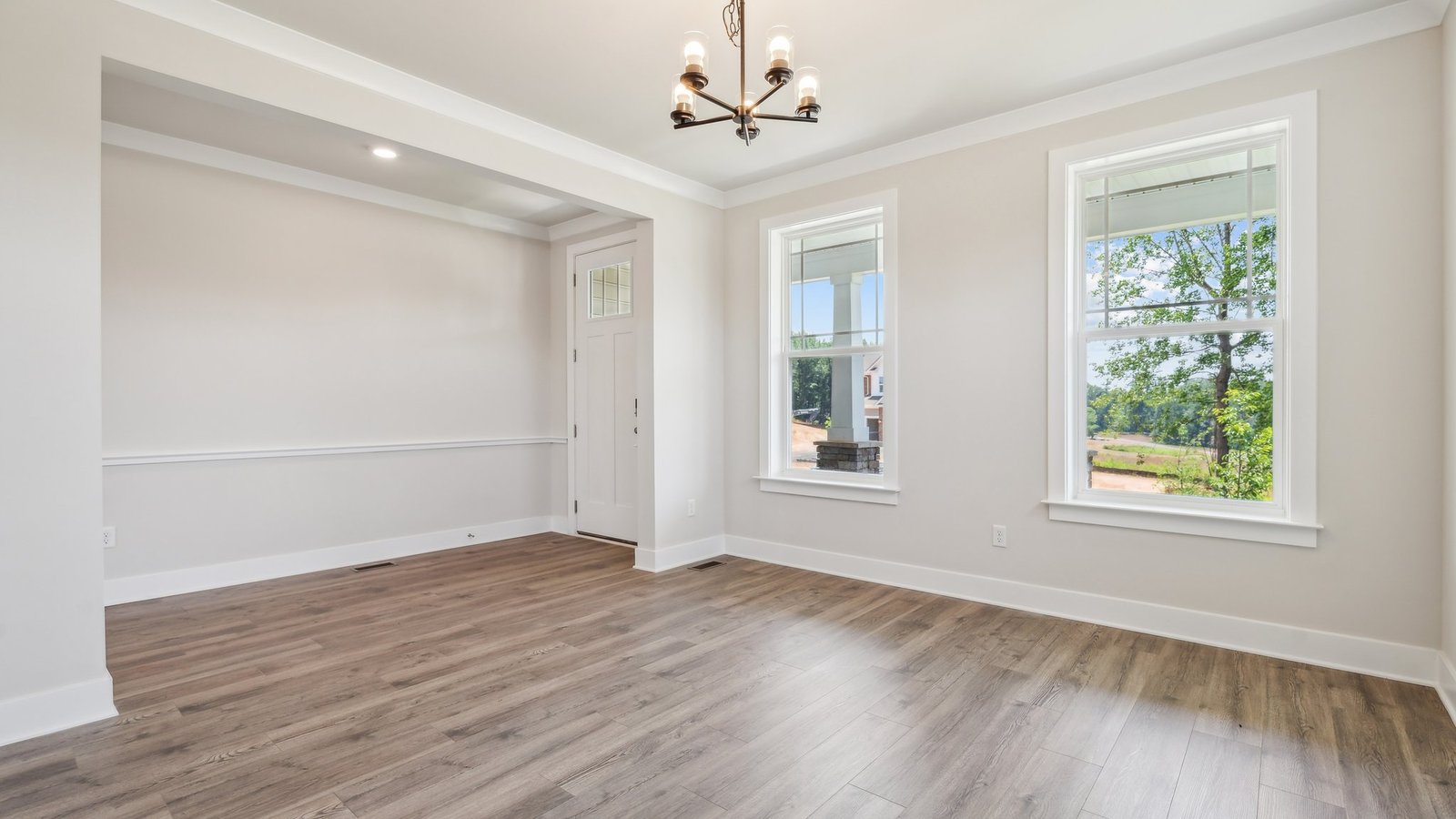 spacious dining room adjacent to the foyer