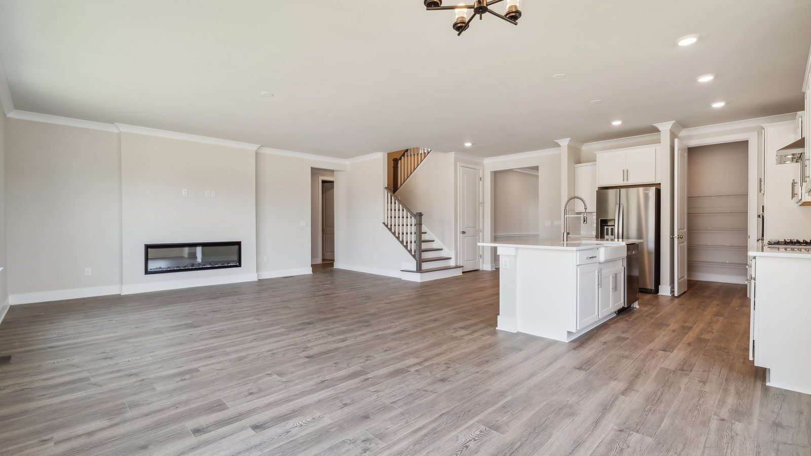 Adjacent to the kitchen are family room and casual dining space