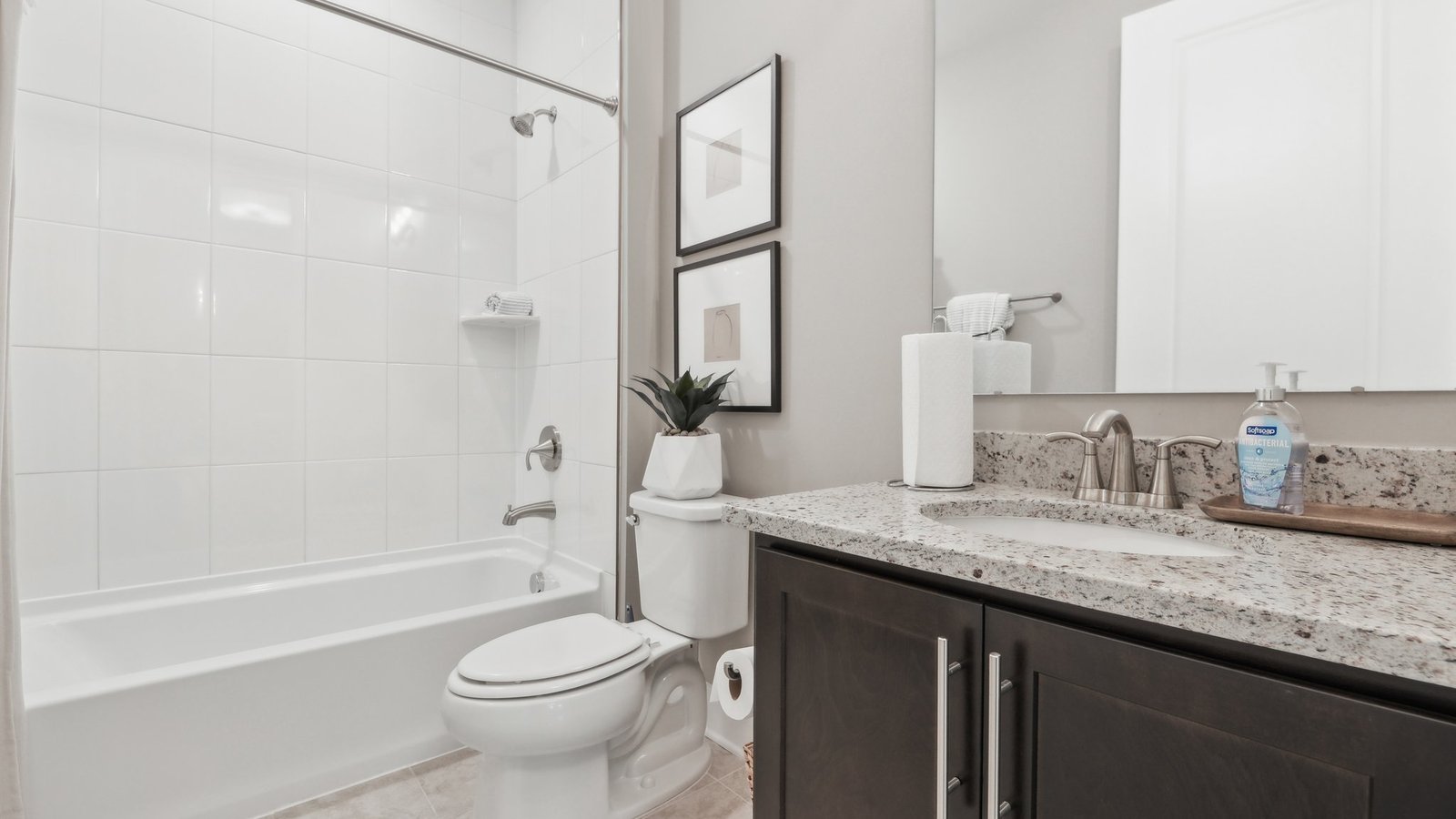 Bathroom featuring a 2-in-1 shower and soaking tub