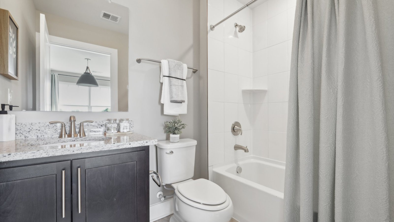 Secondary bathroom with a 2-in-1 tub and shower