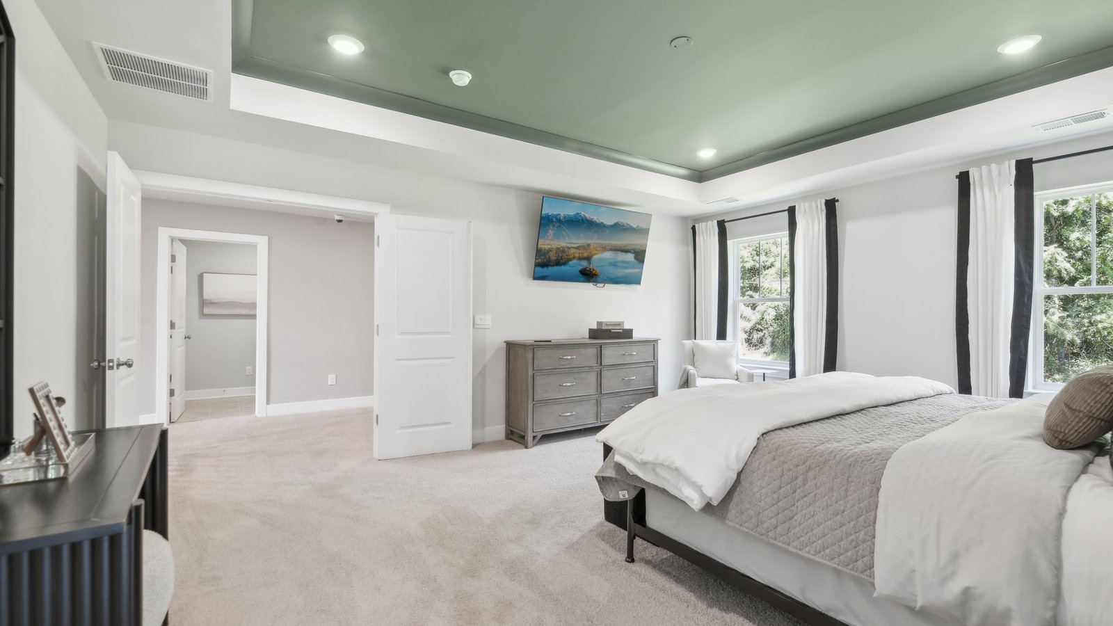 Tray ceiling in the primary bedroom
