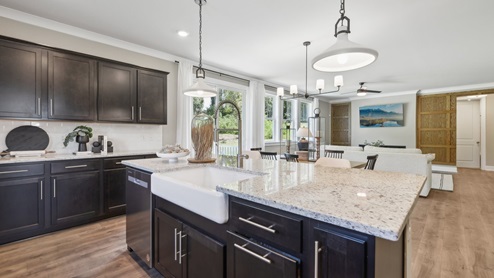 kitchen island comes with a sink and a dishwasher