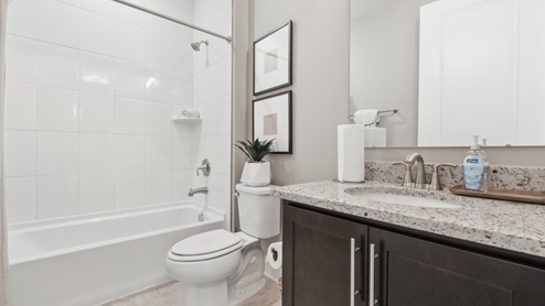 bathroom with a tub
