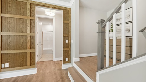 hallway with staircase to the right