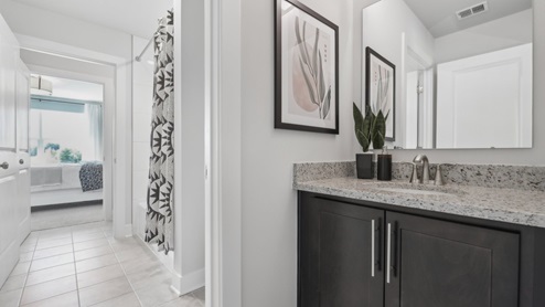 bathroom opens up to the master bedroom