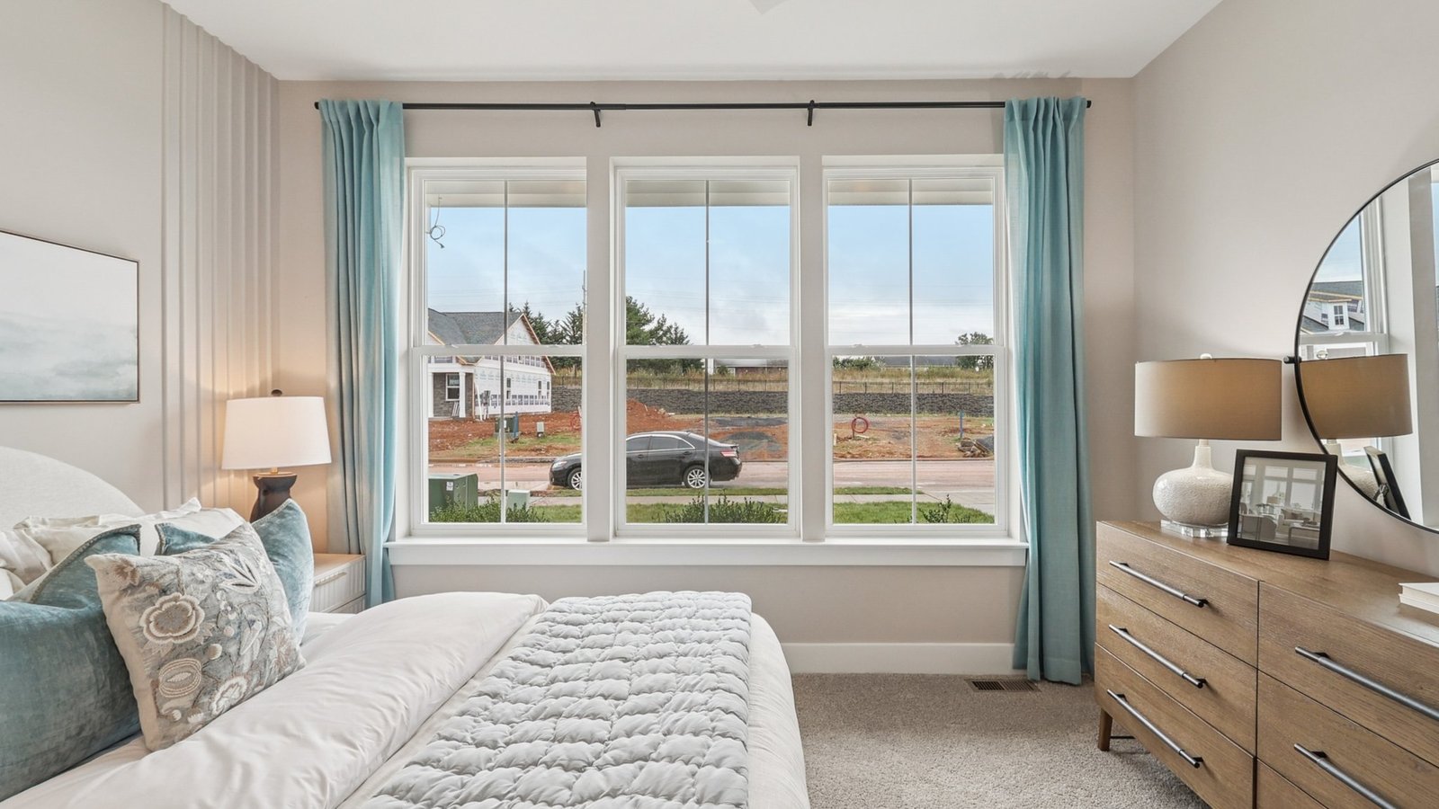 Secondary bedroom on the main floor overlooking the front yard