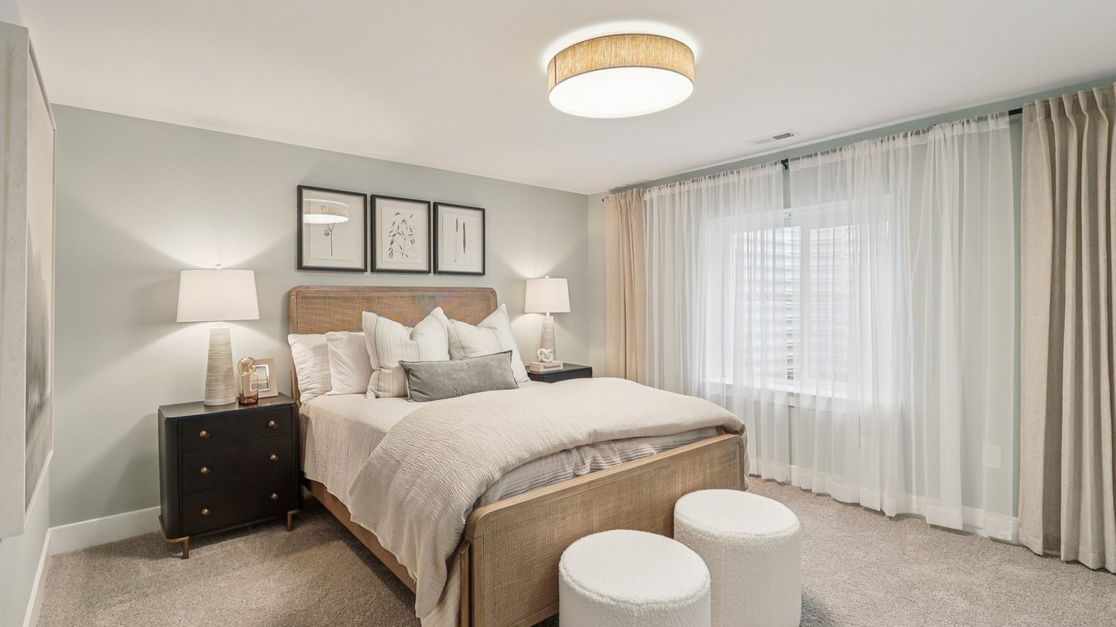 large basement bedroom with king bed