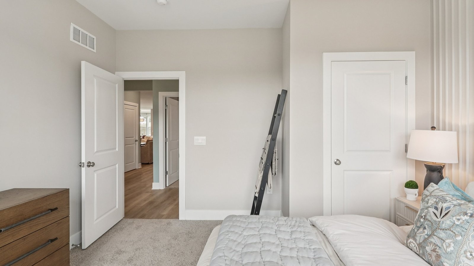 Secondary bedroom on the main floor overlooking the front yard