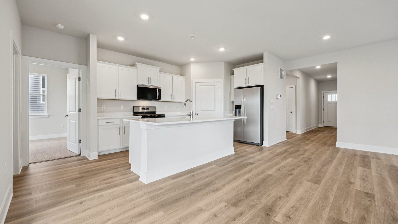 Breakfast island comes with a sink and dishwasher perfect for prepping food and cleaning