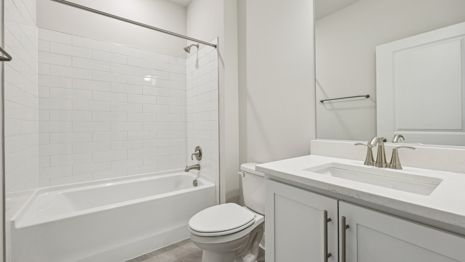 Secondary bathroom located between two secondary bedrooms comes with a bathtub