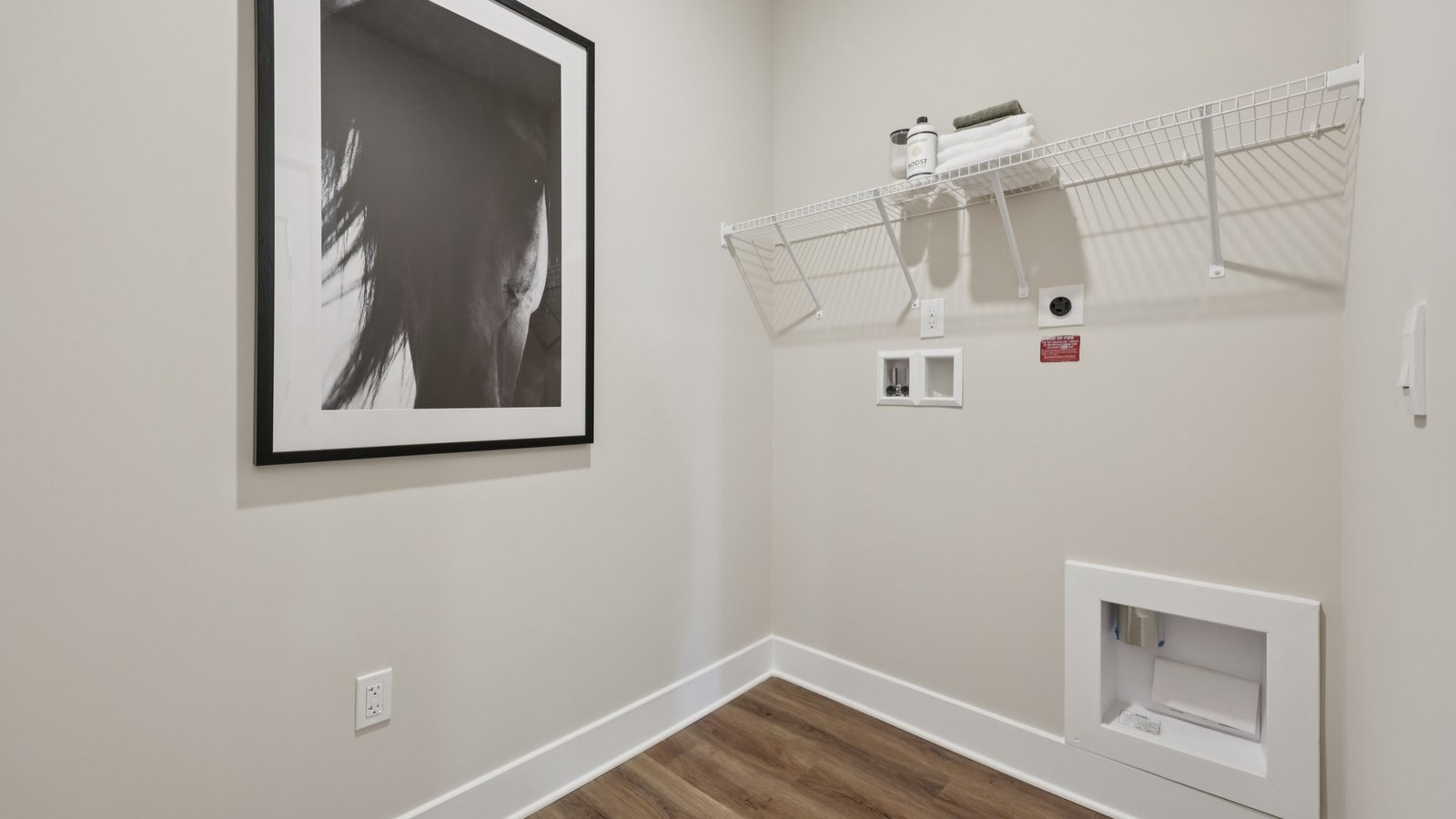 laundry room with storage space