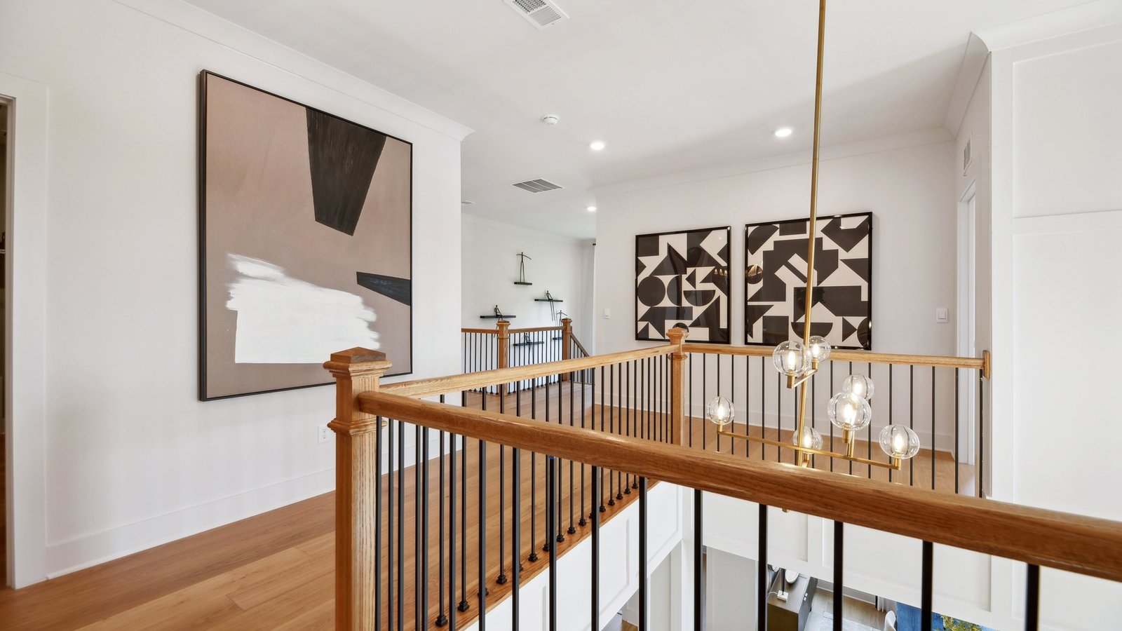upstairs halls illuminated by the natural light of the grand foyer