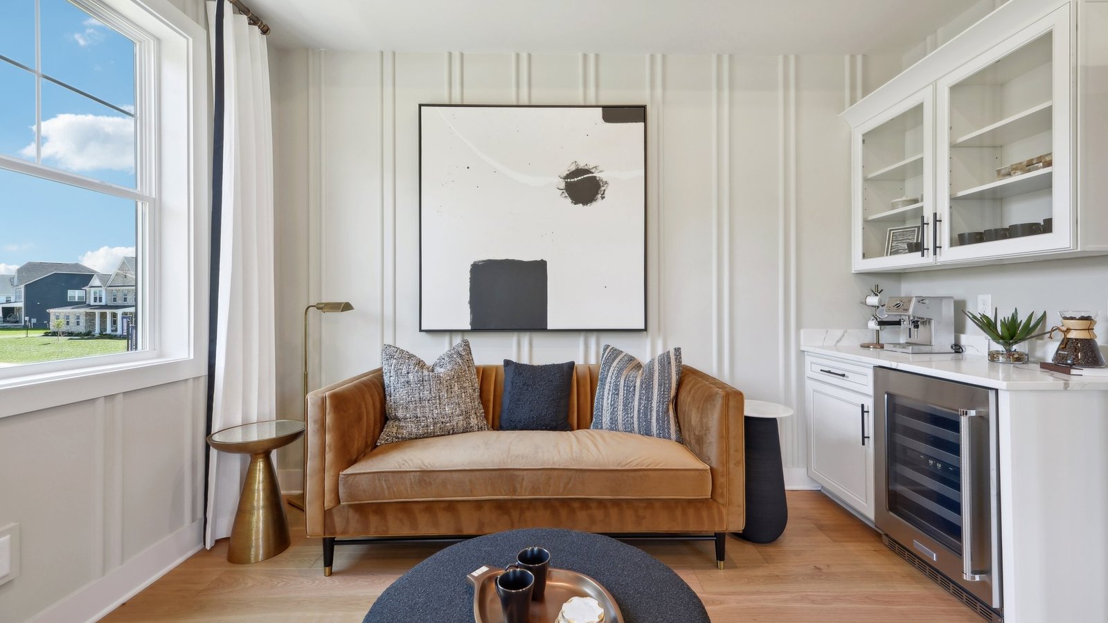 our model is decorated with large art pieces that amplify the grandeur of the space