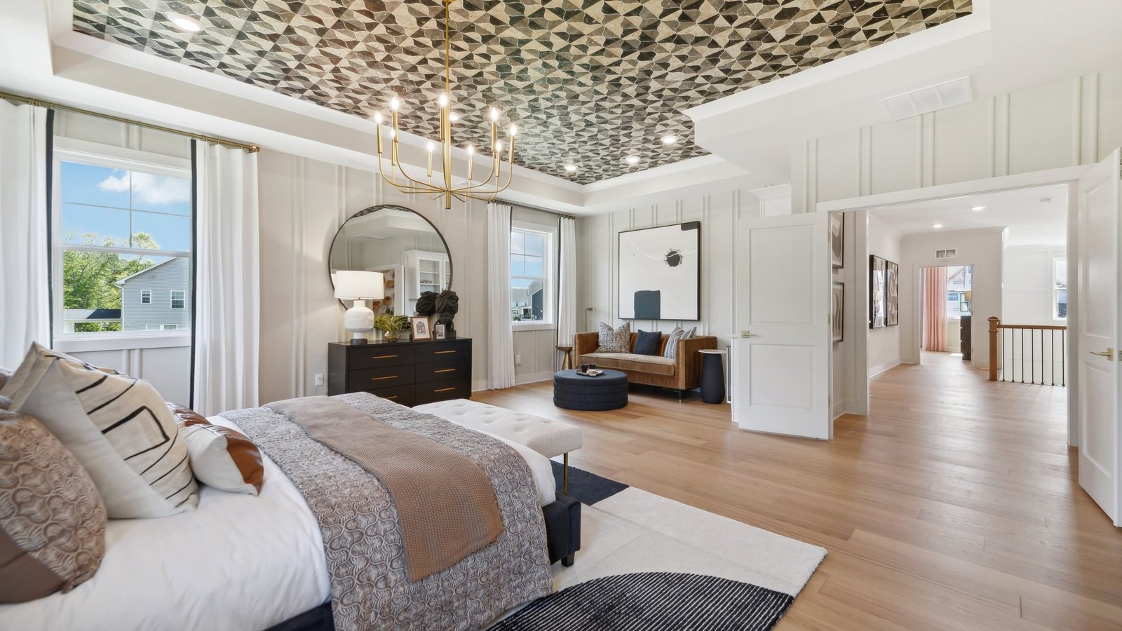 primary bedroom has enough space for an extra couch or a desk